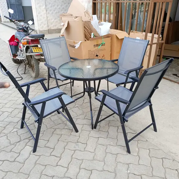 Outdoor Table With Four Foldable Chairs