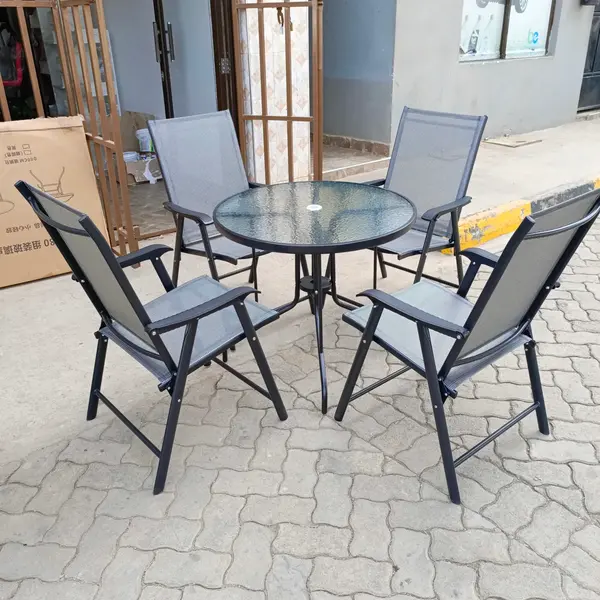 Outdoor Table With Four Foldable Chairs