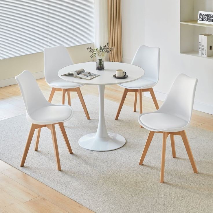 Cocktail table with four padded chairs