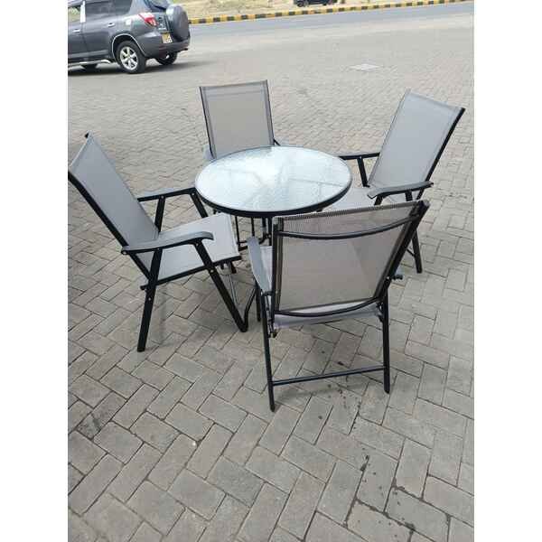 Outdoor Table With Four Foldable Chairs