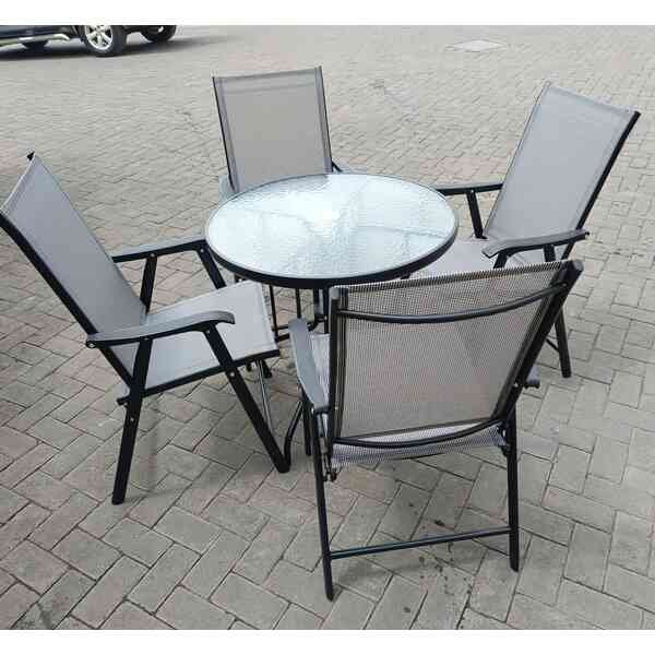 Outdoor Table With Four Foldable Chairs