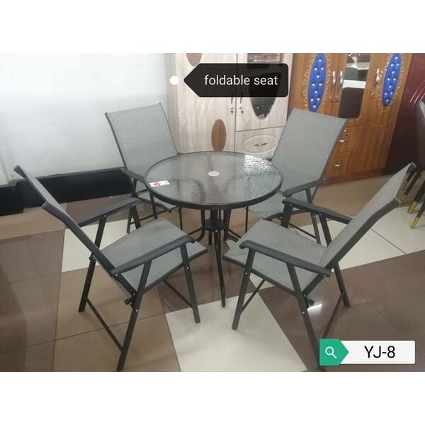 Outdoor Table With Four Foldable Chairs